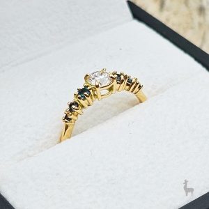 Anillo con Diamante GIA 0.40 kilates & Topacios London Blue